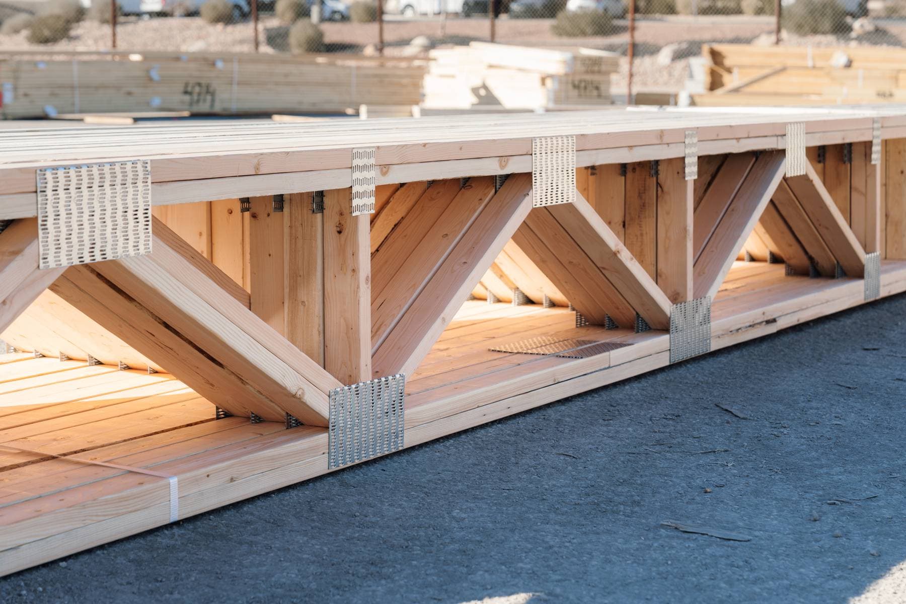 Custom wood roof and floor trusses in production at Lone Pine Truss