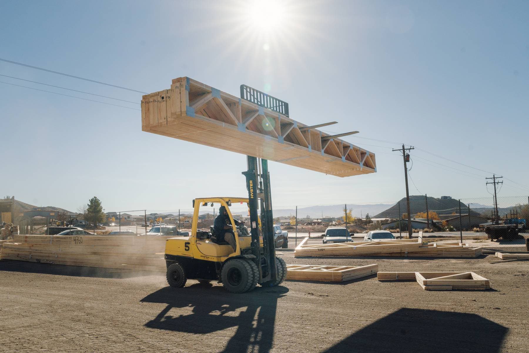 Forklift holding trusses